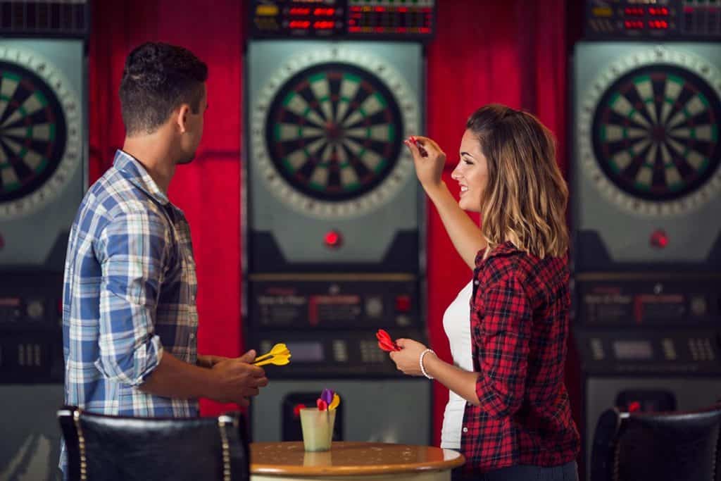 couple playing darts